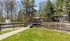 Serene park setting with a picturesque pond, charming gazebo, and tranquil fountains surrounded by lush greenery.| The Royal Crest | Apartment in North Andover, MA