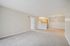 The pleasant living room creates a warm and comfortable atmosphere perfect for daily relaxation.  | Village Green | Apartment in,Tewksbury MA