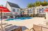 Your overlooking pool offers relaxing water views with recreational activities and community atmosphere. | Mill & 3 Apartments | Chelmsford Apartments