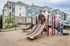 See how everyone enjoys our engaging playground designed for safe and active play. Just one more way our community caters to your needs! | Mill & 3 Apartments | Mill & 3 Apartments Apartments
