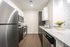 The modern kitchen offers streamlined design with efficient workflow and attractive finishes throughout. | Mill & 3 Apartments | Mill & 3 Apartments Apartments