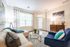 This thoughtfully designed living room maximizes comfort and functionality with smart layout choices. | Mill & 3 Apartments |