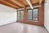 This spacious living room offers plenty of room for relaxation and entertaining with flexible layout options.  | 381 Congress Lofts |