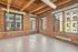 The well-proportioned living room offers versatile space for relaxation, entertainment, and personal expression. | 381 Congress Lofts | Apartment in, Boston MA