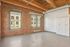 The open living area provides flexible space that adapts to your changing needs throughout the day. | 381 Congress Lofts | Boston Apartments
