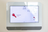 Modern smart home control panel with a locked front door status, showcasing advanced home security features.