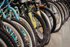 Vibrant display of colorful bicycles lined up in a showroom, showcasing variety and style.