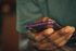 Close up of a hand using a cell phone