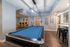Pool table in clubhouse at The Pavilion on Berry | Apartments in Saint Paul, MN