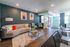 Seating and decoration in lobby area at The Pavilion on Berry | Apartments in Saint Paul, MN