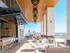 The Full-Service Indoor-Outdoor Bar at Two Light Luxury Apartments