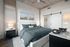 Arlington Entertainment District luxury apartment featuring cozy bedroom