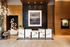 Luxurious lobby with elegant marble reception desk, modern art, and chic lighting accents.