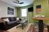 couch and wall art at Greenway Studios