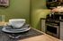 place setting on dining table in a studio apartment