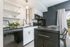 Oven, refrigerator, dishwasher and microwave in studio apartment