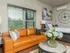 Orange couch in studio apartment in Galloway