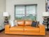 Orange leather couch in studio apartment in Galloway