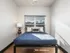 Blue bedspread in one bedroom at Galloway Creek