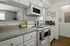 Driscoll Place | Kitchen Counters, Spacious Cabnets, and Oven