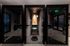 Contemporary podcast pods and office space showcasing sleek private booths with modern seating and  lighting.