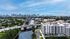 Beautiful aerial view of Tides at River Rapids with picturesque cityscape views and waterfront access, featuring modern architecture and vibrant surroundings.
