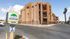 View of Residence at Tropicana with modern architecture and ample parking space.
