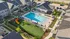 Charming apartment complex with a pristine swimming pool and colorful playground, providing a friendly community atmosphere.