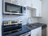 A6 Kitchen - detail stainless steel range | 2501 Beacon Hill | Kansas City, MO Apartments
