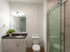 B7 Bathroom with glass shower doors | 2501 Beacon Hill | Kansas City, MO Apartments