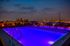 Nighttime Roof Top Pool | 2501 Beacon Hill | Kansas City, MO Apartments