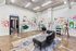 Vibrant, creative space with colorful hand-painted graffiti on walls, modern furniture, and industrial accents.