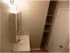 Bathroom with medicine cabinet and linen shelves