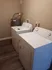 Laundry area in one bedroom apartment with full size washer and dryer
