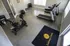 Bright and modern fitness room featuring treadmills, exercise bike, and free weights at Grace Lane Apartments.