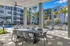 Shaded Poolside sitting and grilling area