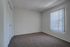 Royal Breeze Apartments Inc, interior, carpeted room, closet, large window with blinds