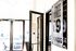 Chic modern entryway displaying a sleek sign for 'Three 19 Pragg,' exuding urban sophistication.
