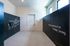 Sleek modern parcel room at Atlas Grand Palms with convenient locker system and inspirational decor.