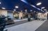 Modern fitness center with state-of-the-art equipment, vibrant decor, and ample workout space.