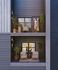 Contemporary apartment balconies with elegant decor, lush greenery, and a stylish resident enjoying the view.