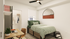 Cozy modern bedroom with stylish desk, inviting bed with green accents, and walk-in closet, perfect for a comfortable living space.