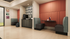 Inviting seating area with modern decor, sleek cabinets, and a coffee station in a bright, contemporary apartment.