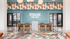 Vibrant and modern lobby at Sterling Tiger Valley with colorful geometric flooring and elegant seating arrangement.