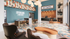Vibrant and modern communal lounge space featuring eclectic decor, cozy seating, and bold geometric flooring at Sterling Tiger Valley.