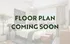 Inviting bedroom with modern decor, large window view, and cozy ambiance; floor plan details coming soon.