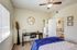 2 BR Apartments in North Las Vegas, NV - Desert Ridge - Well Lit Bedroom with Oversized Closet, Attached Bathroom, Queen Bed, and Carpeted Flooring