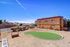 Pet Friendly Apartments in North Las Vegas, NV - Desert Ridge - Spacious Bark Park with Mountain Views, Turf Patch, and Bench Seating
