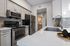 Upgraded finishes and stainless steel appliances in the kitchens at Gramercy Park, an upscale apartment community in Houston, Texas offering 1-, 2-, and 3-bedroom floor plans.
