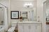 Bathroom with single vanity soaking garden tub